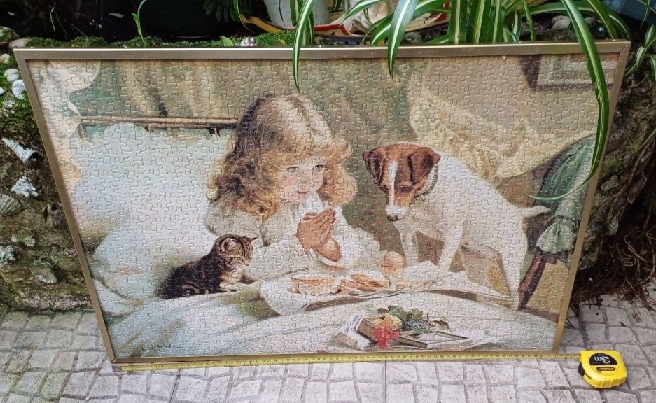 Puzzle, quadro. Menina a rezar com cão.