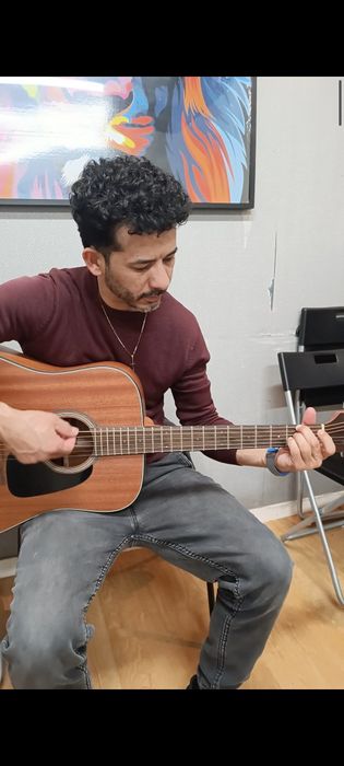 Aulas de Guitarra Acústica / Elétrica