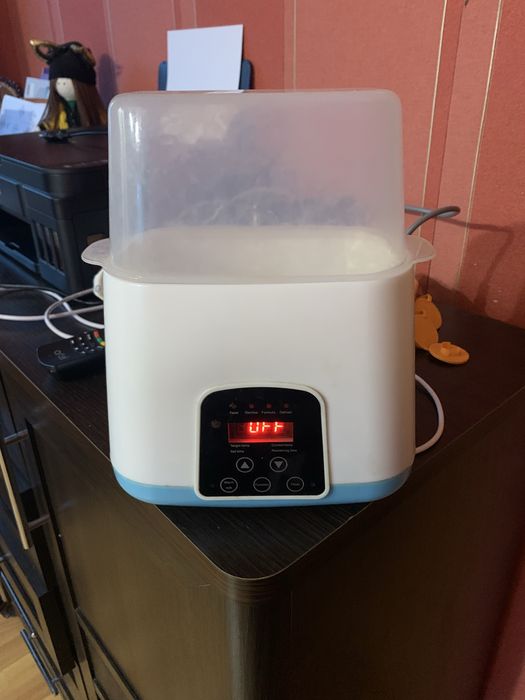 Підігрівач та стерилізатор для пляшечек