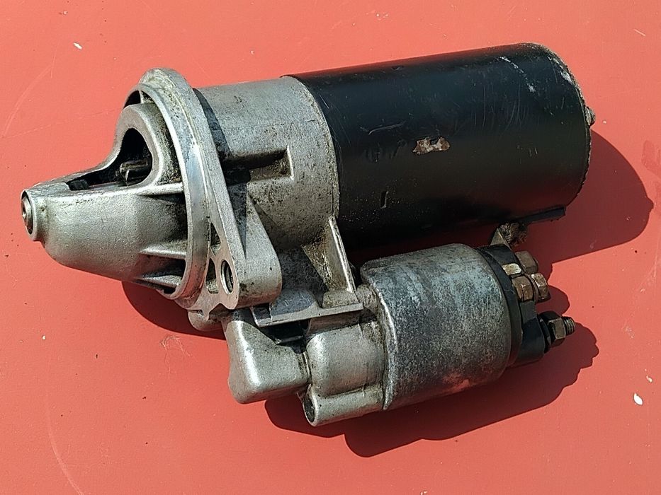 Стартер на кадет 1.8