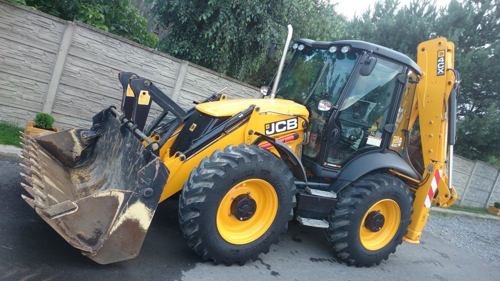 Послуги екскаватора навантажувача. Оренда спецтехніки.