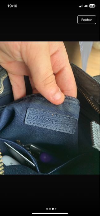 Bolsa lacoste semi nova