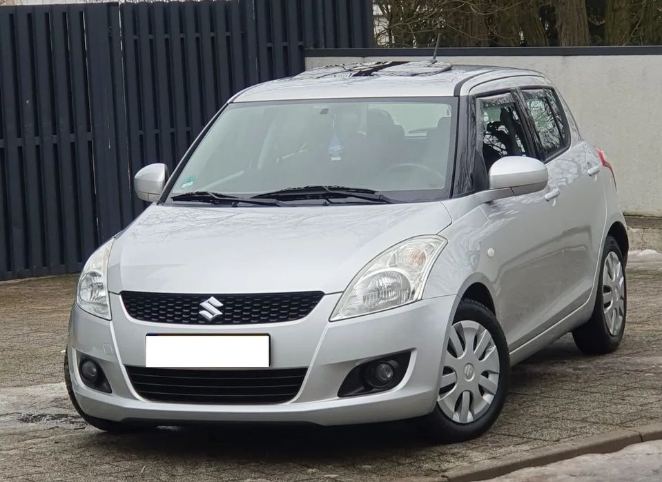 Suzuki Swift Grzane Fotele * Szyberdach * Benzyna * Klimatyzacja automatyczna *