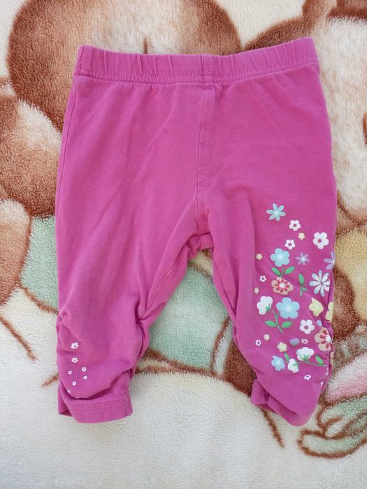 Różowe marszczone legginsy w kwiaty kwiatki KappAhl 74 jak nowe