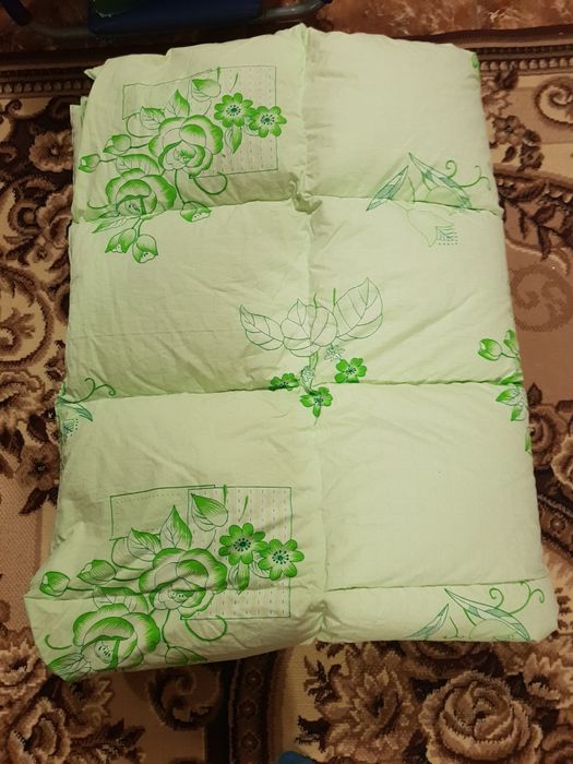 Пухова перина нова