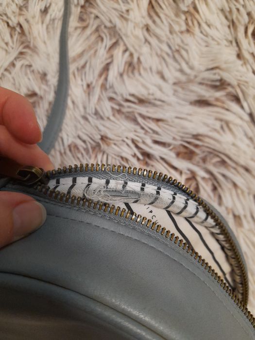 Кругла сумочка, шкірозамінник