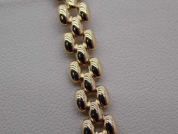 Złota bransoletka pękate ozdoby 19 cm. 6,4 mm.