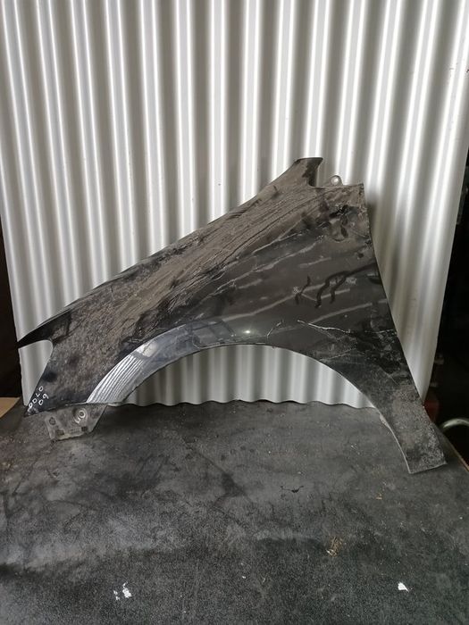 Guarda lamas VW Polo 6R ESQUERDO  preto