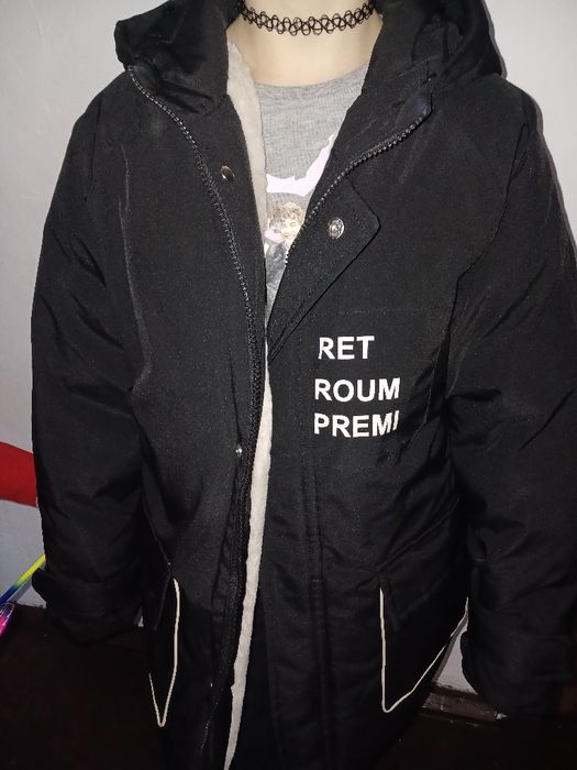 Зимова  теплюща куртка