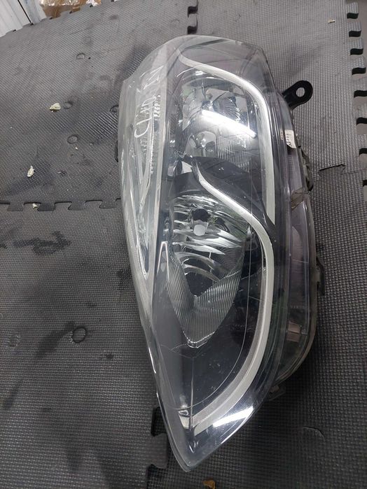 farol esq Renault Clio iv