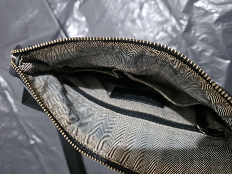 Шкіряна сумка Piquadro та Timberland