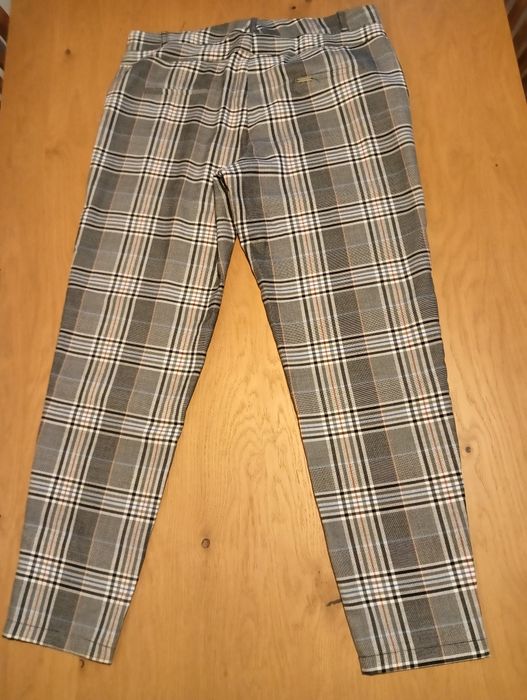 Spodnie w kratę damskie