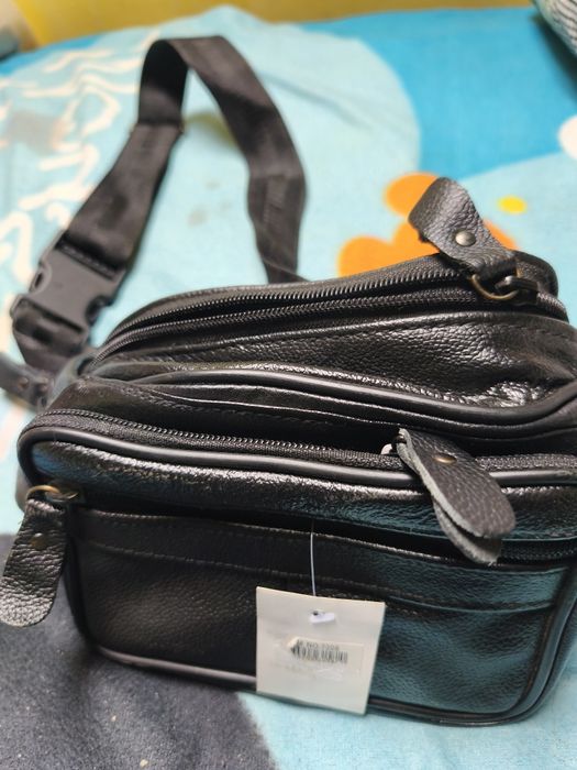 Sprzedam szaszetke typu nerka na pasku nową