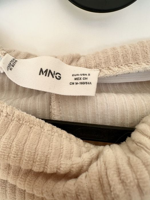 Beżowe spodnie ze sztruksu wide leg Mango