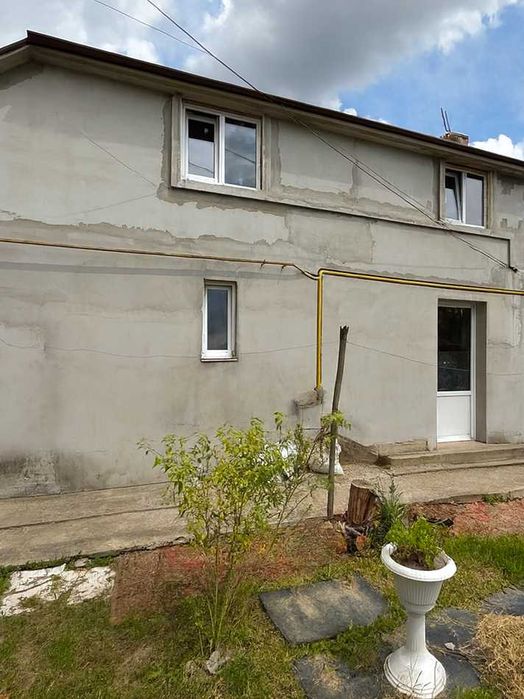 Квартира з окремим входом, автономним опаленням та ділянкою 2.5 сот