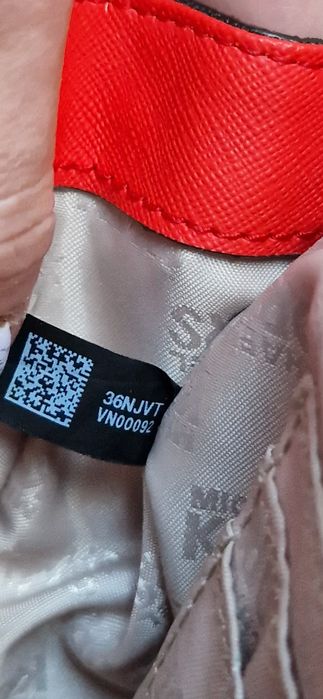 Skórzana torebka listonoszka oryginalna Michael Kors