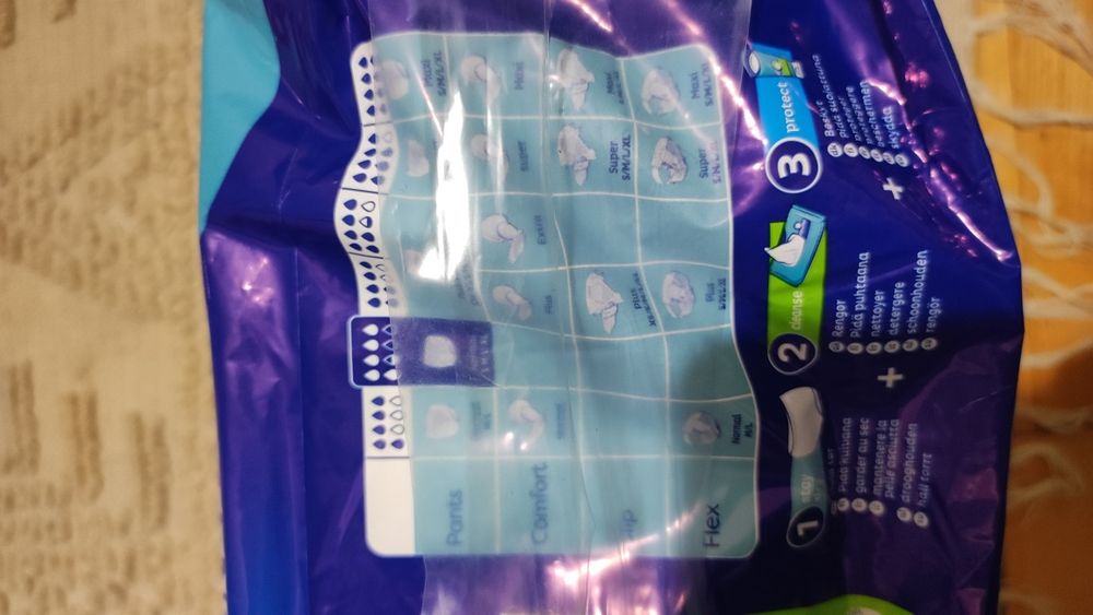 Tena трусики, підгузки розмір  XL