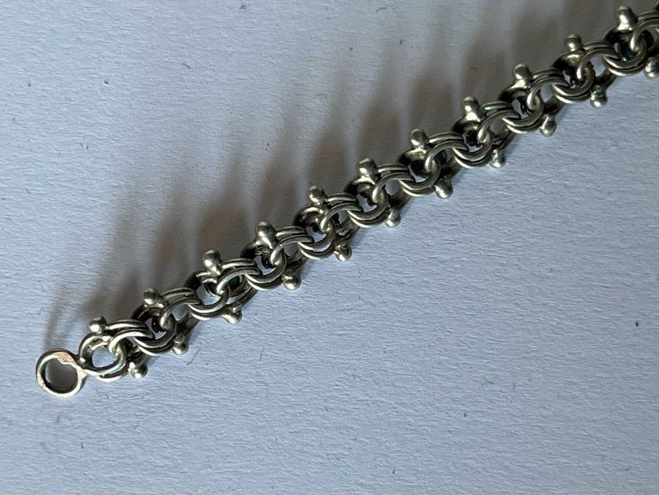 Pulseira em prata antiga trabalhada e com pedras azuis