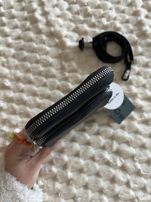 Mala carteira desportiva em preto