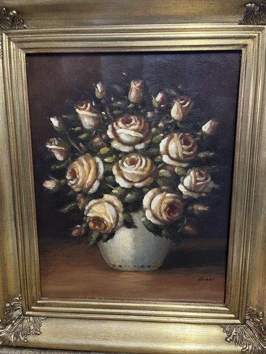 Quadro com moldura dourada