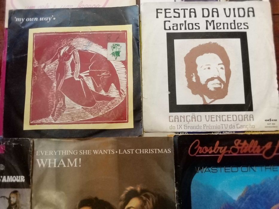 Lote de singles em vinil [Creedence, Simon & Garfunkel, Duran Duran]