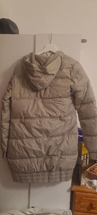 Casaco de penas comprido