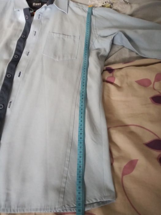 Błękitna gładka koszula męska