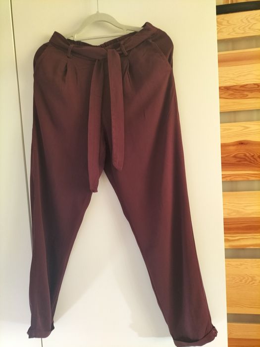 Letnie spodnie na gumce marki Carry rozmiar XS stan bardzo dobry.