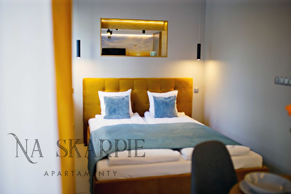 Apartament Na Skarpie 1 - noclegi nad jeziorem, promenada, Mazury