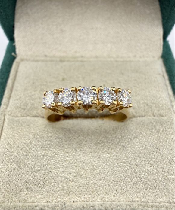 Złoty pierścionek 750 z diamentami 0,80ct Si1-P1/G-F