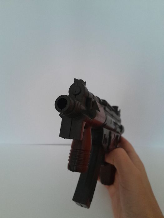 Іграшковий автомат зі звуком