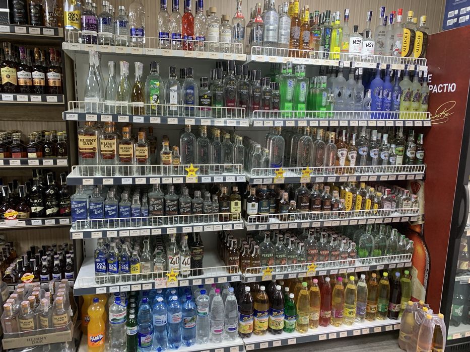 Стелажі для магазину. Касова зона. Торгове обланання