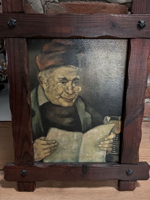 Obraz w drewnianej ramie .