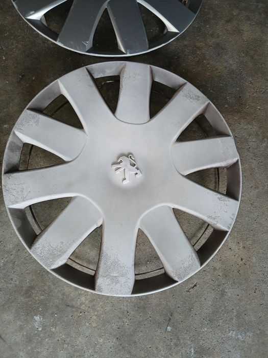 Tampões Peugeot originais roda 14 usados..