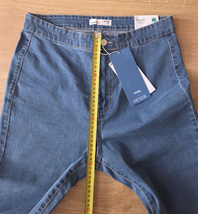 Nowe dżinsy dzwony Sinsay L/XL