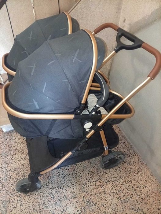 Carrinho de gémeos