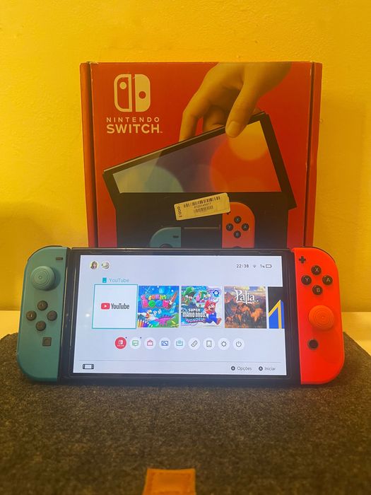 Nintendo Switch OLED + Comando Subsonic + Jogos + Estojo de Transporte (Como Nova)