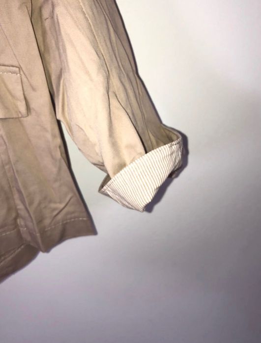 Kremowa marynarka z kokardką