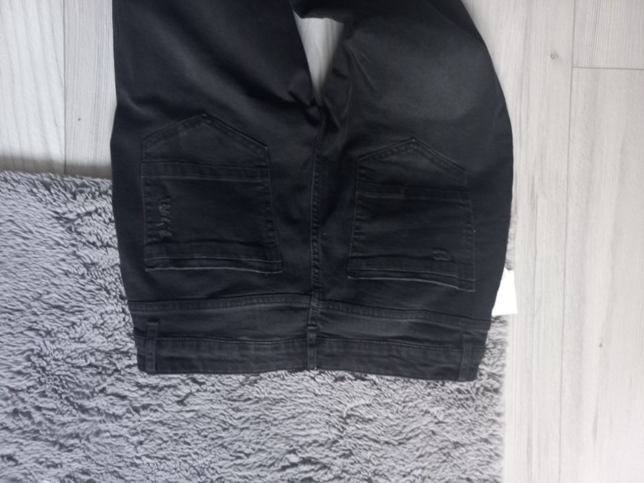 Nowe spodnie chłopięce 164/170