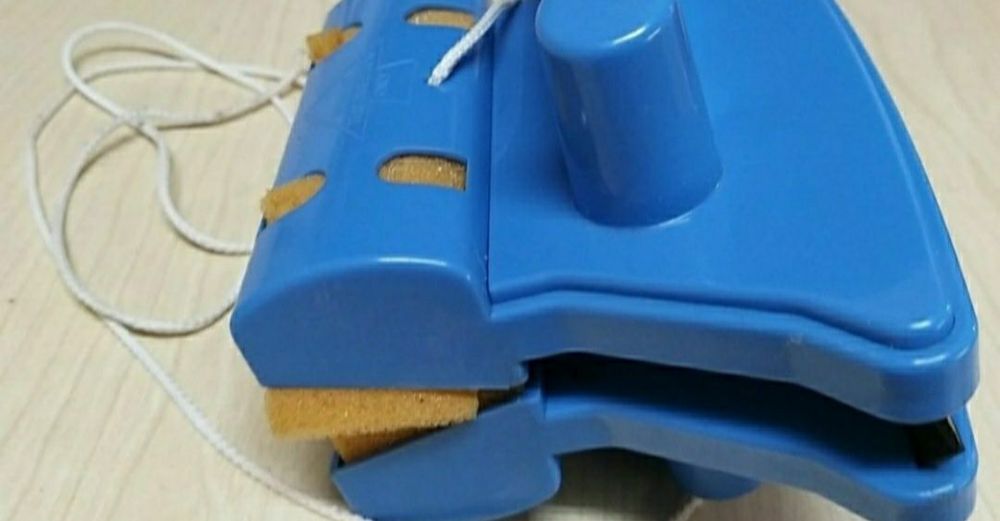 Limpa vidros magnético.