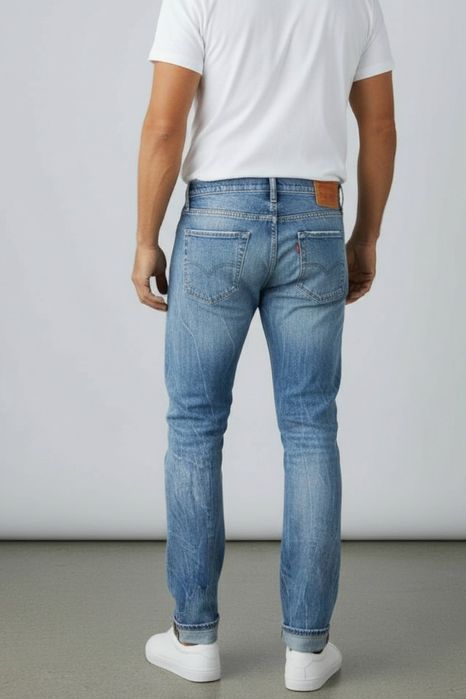 K21 Spodnie męskie jeansy LEVIS slim jasne dzinsy proste 31/32 M