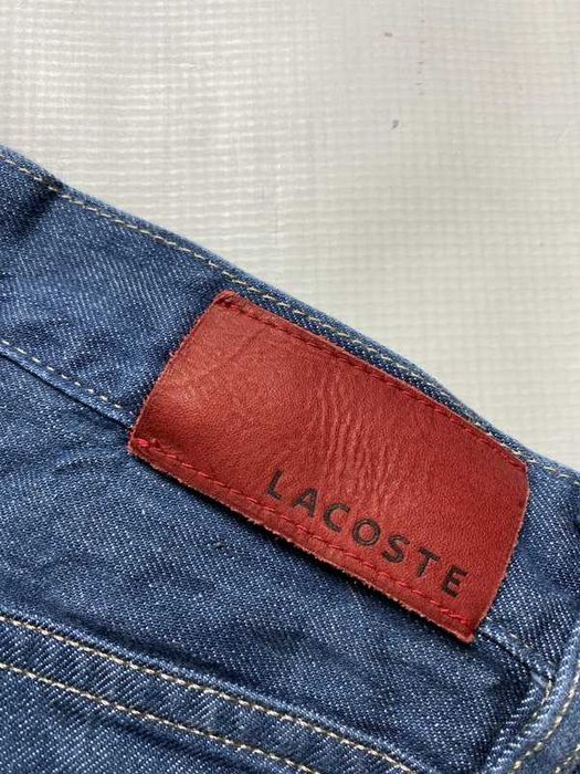 Lacoste LIVE oryginalne niebieskie męskie Spodnie Jeansy W 32 L 32