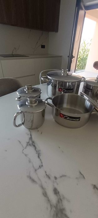 Panelas marca suprema em  inox