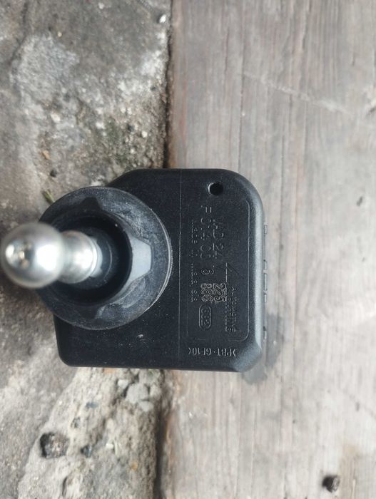 Електро регулятор нахилу фар вантажівки