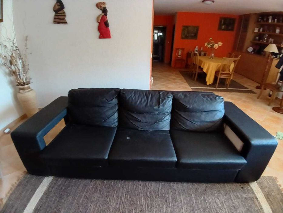 Sofá e poltrona em pele