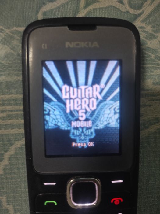 Nokia c1 com jogos /carregador