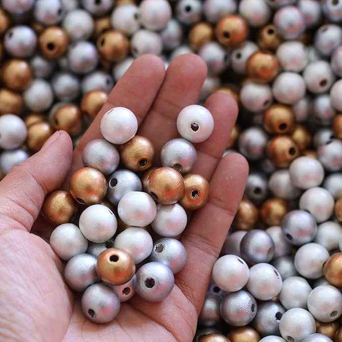 180drewnianych koralików z otworem, złote, srebrne, białe, 14 mm
