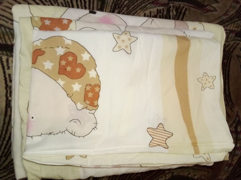 Дитяча постіль в ліжечко