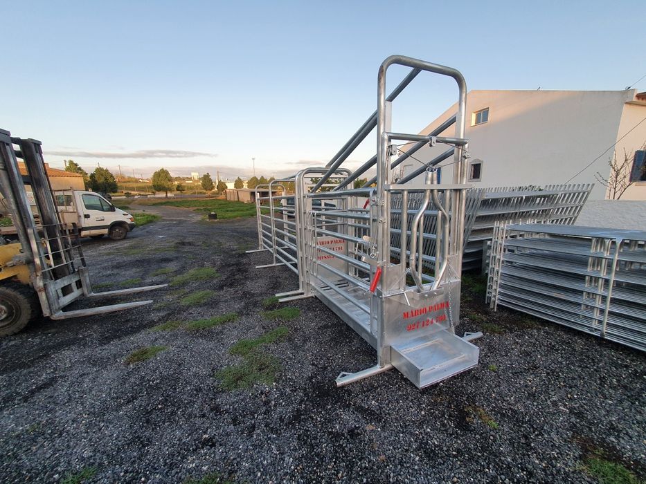 Manga de vacas com tronco