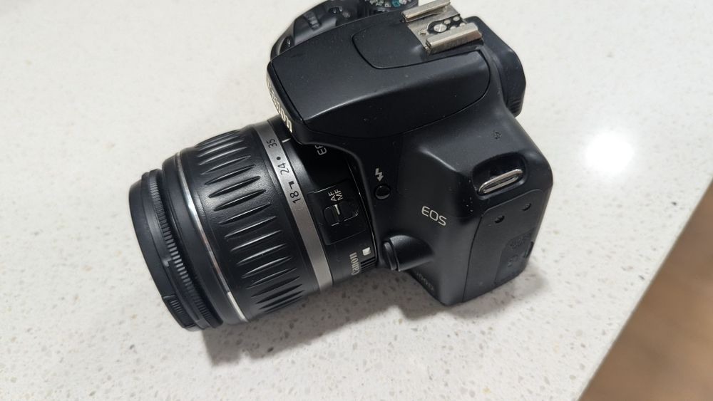 Canon 1000D + Lentes